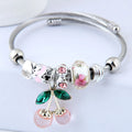 Beautiful Cherry Charm Bracelet in silver with pinch cherries & Gold with red Cherries