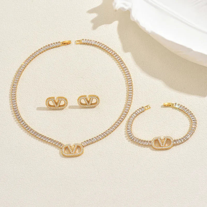 Elegant Necklace, Earrings and Bracelet. 18K Real Gold Plated